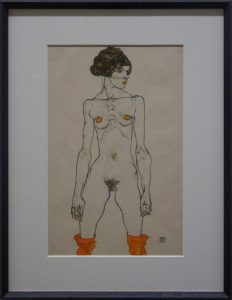 Stehendes nacktes Madchen mit orangefarbenen Strumpfen / Standing Nude Girl with Orange Stockings