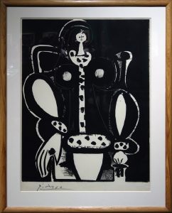 Woman in an armchair (from the black plate)