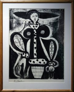 Woman in an armchair (from the black plate)