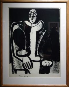 Woman in an armchair (from the red plate)